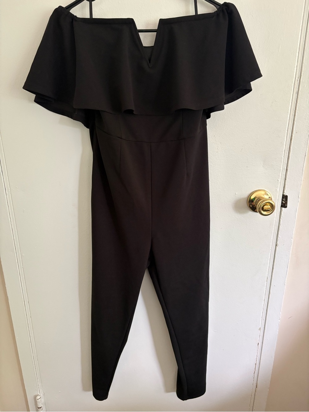 Off-Shoulder Black Jumpsuit with Ruffle Neckline